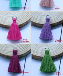 Detailed close-up of 3.5cm cotton-polyester tassels in six assorted colors with silver rings