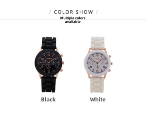 Detail of Geneva quartz watch showing silicone straps in black and white with rose gold case