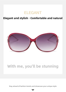 Detail view of oversized oval wine red sunglasses with elegant purple gradient lenses