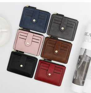 Slim multi-slot card holders in six matte leather colors with secure zipper pocket