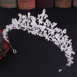 Exquisite bridal crown with crystal glass rhinestones and intricate silver alloy floral design