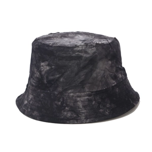 Detailed view of tie-dye bucket hat featuring reinforced stitching and ink wash pattern