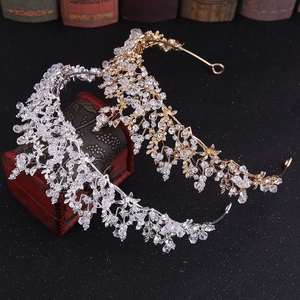 Elegant Baroque bridal crown with handmade crystal glass rhinestones on vintage background