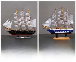 Détails de maquettes de voiliers en bois faites main avec voiles en tissu et cordages