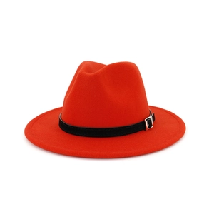 Classic red wool fedora hat with a black belt buckle band on a white background
