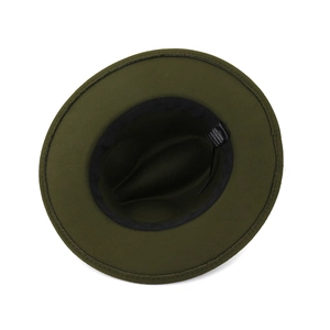 Detail view of dark green wool fedora interior showing cotton lining and care label