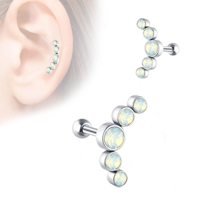 Detail view of surgical steel ear stud featuring curved row of white opals and ball back