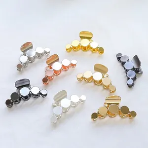 Minimalist geometric circular metal hair claws in gold silver and matte finishes