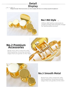 Detailed macro of a gold alloy hair claw clip featuring polished plated rings