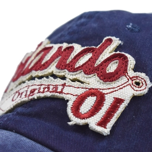 Vintage washed navy blue baseball cap with 3D letter embroidery and curved brim style