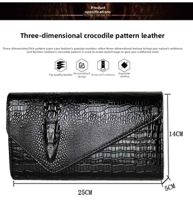 Detail showing the 25x14x5cm dimensions of this elegant black crocodile texture clutch bag