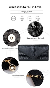 Close-up of black crocodile pattern leather clutch featuring gold magnetic clasp and chain