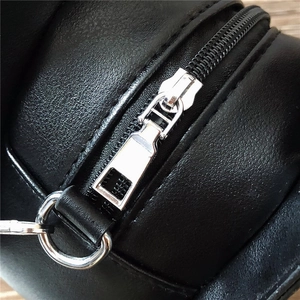 Creative guitar-shaped crossbody bag with black pebble leather and silver metal zipper