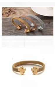Detail view of 60mm mesh bangle with 15mm angel charms showing size specifications