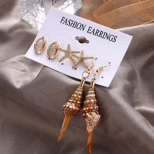 6-pair set of gold ocean theme earrings featuring shell, starfish and conch pendants