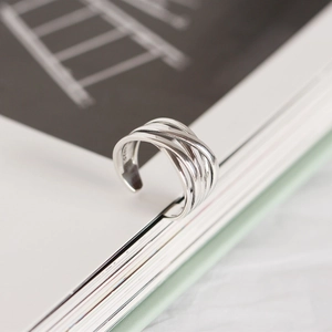 Macro shot of S925 sterling silver multi-layer woven ring with adjustable opening