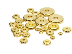 Flat solid brass spacer beads for DIY jewelry making shown in various sizes on white background