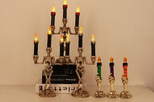 Detailed Halloween skull candle holders with LED flickering flame and bat patterns