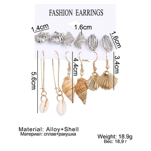 Detailed view of 6 pairs of ocean-themed earrings featuring shell and starfish motifs