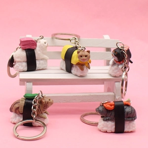 Set of five cute sushi cat keychains featuring various kittens on rice with metal rings