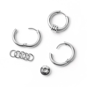 Minimalist silver stainless steel hoop earrings set for men on a clean white background