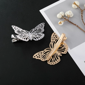 Hollow butterfly metal hair clips in gold and silver finish with duckbill spring grip