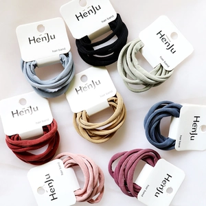 Set of 8 chic high-elasticity hair bands in various colors on paper cards