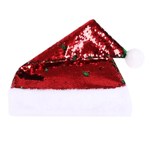 Detail of red and green sequined Christmas hat with white plush trim and top pom pom