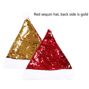 Close-up of reversible red and gold sequins on a festive Christmas hat with white fur trim