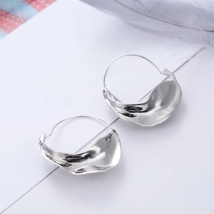 Irregular silver alloy basket earrings with a minimalist metallic wavy design
