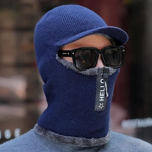 Detail of navy knit balaclava showing thick gray fleece lining and adjustable zipper mask