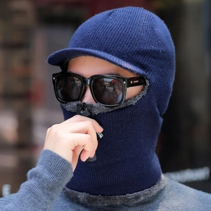 Close-up of navy blue knitted hooded mask with thick fleece lining and zipper detail