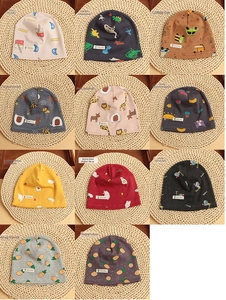 Detailed grid view showcasing various cartoon print patterns on cotton baby beanie hats