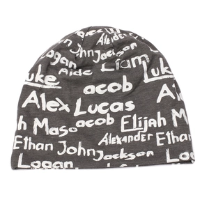 Detail of dark grey knit beanie featuring white handwritten name prints and soft texture
