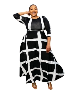 Detailed view of high waist plus size dress featuring black and white checkered patterns