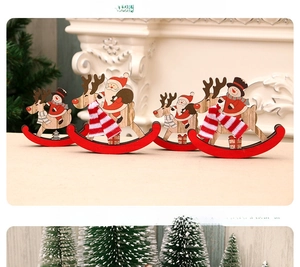 Close-up of wooden Christmas rocking horse ornament with Santa, reindeer and snowman