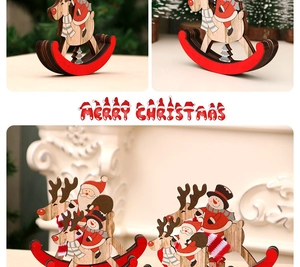 Close-up of wooden rocking horse Christmas ornament with Santa and snowman details