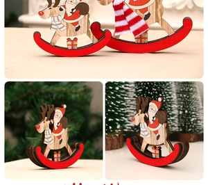 Detail of wooden Christmas rocking horse ornament with Santa Claus and a red base