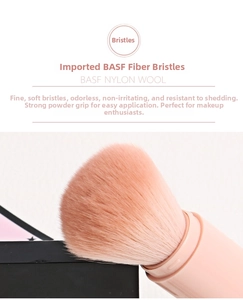 Detail of soft pink BASF fiber bristles on a 4-in-1 retractable makeup brush