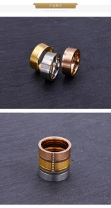 Macro shot of brushed titanium steel rings with cubic zirconia in gold, silver, and rose gold