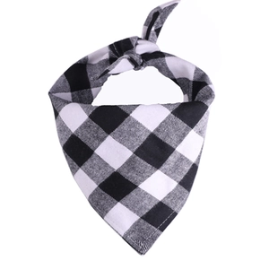 Close-up of a black and white gingham plaid cotton dog bandana with a knot detail