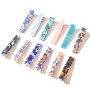 12-piece set of acrylic leopard and marble print rectangular hair clips with gold metal base