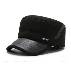 Detail of winter flat top military cap with SPORT embroidery and faux leather brim