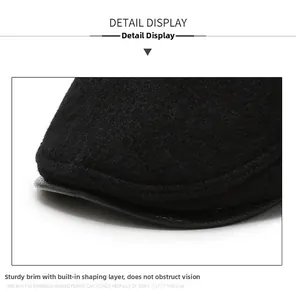 Detail of reinforced brim on black wool beret showing durable construction and structure