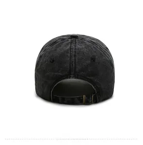 Detail view of washed cotton baseball cap with adjustable antique bronze metal buckle