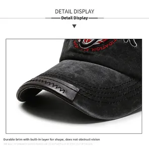Detail of washed cotton baseball cap brim with brown leather edge and neat double stitching