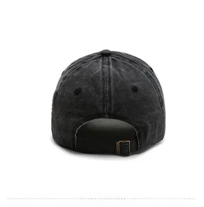 Rear view of washed black denim baseball cap with adjustable metal buckle and embroidery