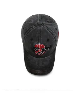 Detailed top view of dark gray washed baseball cap with New York embroidery and leather patch