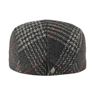 Classic grey plaid wool beret cap with subtle red stripes and metal button detail