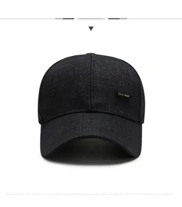 Front view of grey plaid baseball cap for men with a golden metal logo plaque detail